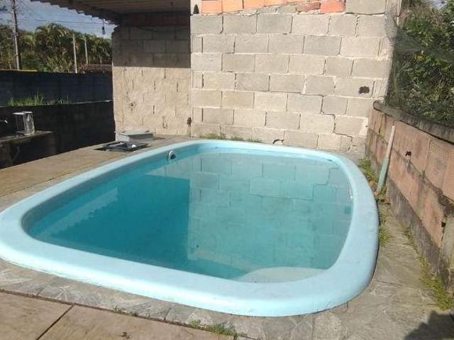 Casa com 2 dormitórios à venda, 60 m² por R$ 130.000 Chácara Glória Itanhaém/SP
