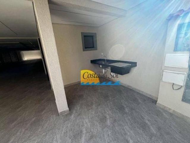 Casa com 2 dormitórios à venda por R$ 650.000,00 Tupi Praia Grande/SP