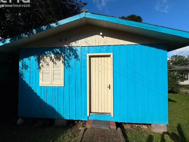 Casa com 2 dormitórios para alugar por R$ 2.485,00/mês Centro Canela/RS