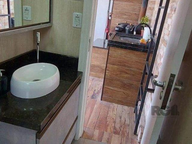 Casa com 2 dormitórios, sendo 1 suíte no bairro Florida em Guaíba