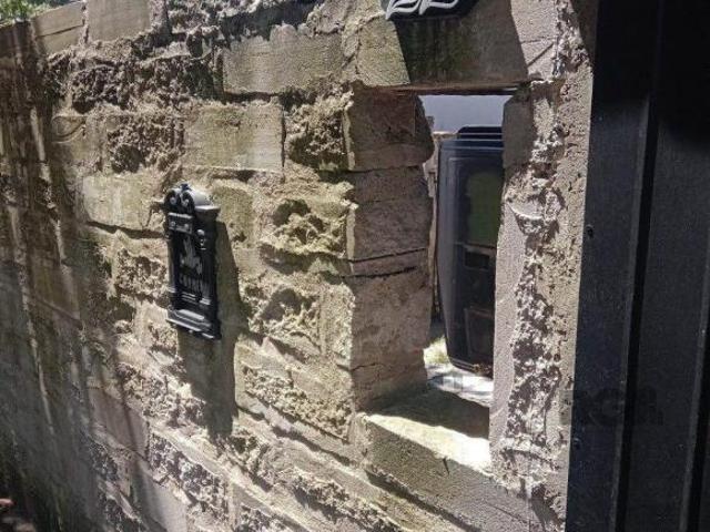 Casa com 2 dormitórios, vaga, amplo pátio, no bairro Santa Rosa de Lima, Poa/RS