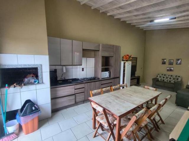 Casa com 2 terrenos