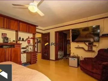 Casa com 3 dormitórios para alugar por R$ 15.400/mês Jardim Lindóia Porto Alegre/RS