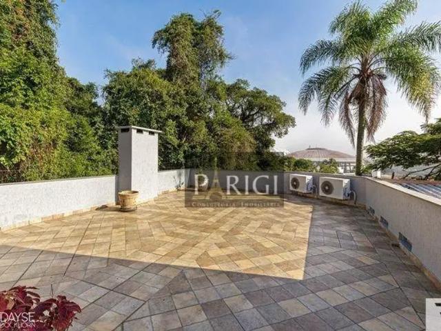 Casa com 3 dormitórios para alugar, 254 m² por R$ 7.227,01/mês Santa Tereza Porto Alegre/RS