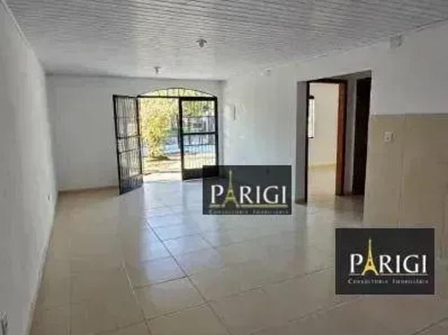 Casa com 3 dormitórios para alugar, 90 m² por R$ 4.076,00/mês Guarujá Porto Alegre/RS