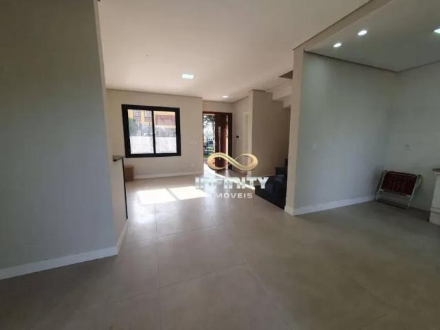 Sobrado alto padrão à venda – 3 dormitórios | suíte | pátio com churrasqueira | bairro paradiso – gr