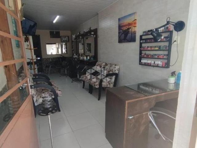 Casa com 3 dormitório, 2 banheiros, piscina aquecida e placa solar à Venda em Santana do Livramento