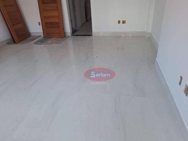 Casa com 3 dormitórios à venda, 140 m² por R$ 1.580.000,00 Ponta da Praia Santos/SP