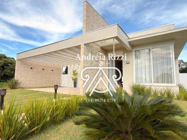 Casa contemporânea mobiliada com 3 suítes, piscina climatizada e área gourmet no Santa Bárbara Resor
