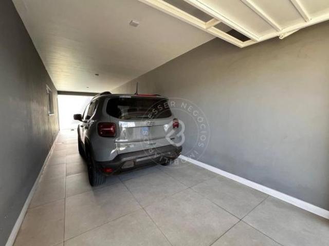 Casa com 3 dormitórios à venda, 198 m² por R$ 990.000,00 Camboim Sapucaia do Sul/RS