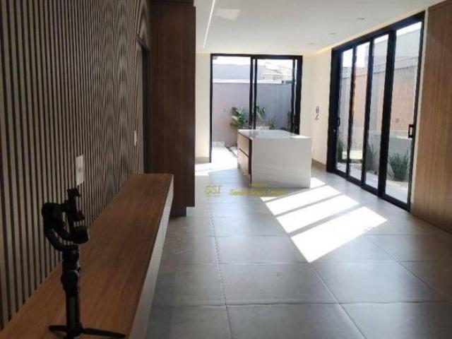 Casa com 3 dormitórios à venda, 206 m² por R$ 2.200.000,00 Parque Universitário Condomínio Olivi