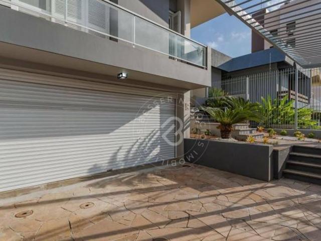 Casa com 3 dormitórios à venda, 223 m² por R$ 1.690.000 Jardim Lindóia Porto Alegre/RS