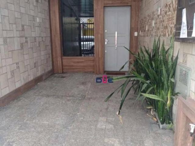 Casa com 3 dormitórios à venda, 240 m² por R$ 1.750.000,00 Gonzaga Santos/SP