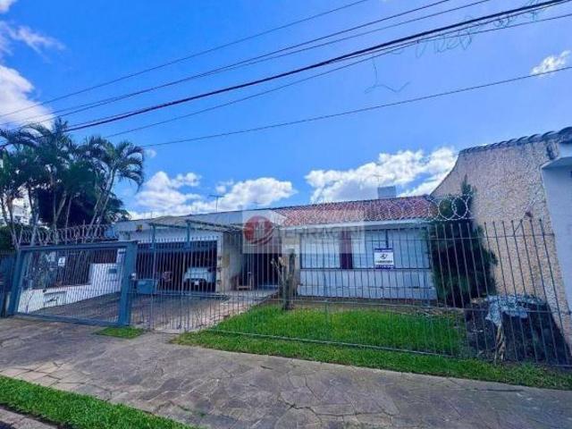 Casa com 3 dormitórios à venda, 240 m² por R$ 850.000,00 Jardim Lindóia Porto Alegre/RS