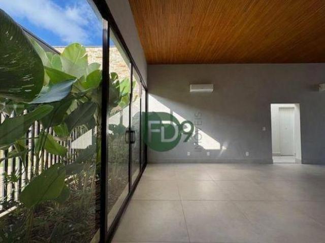 Casa com 3 dormitórios à venda, 310 m² por R$ 3.500.000,00 Condomínio Phillipson Park Americana/