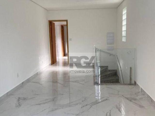 Casa com 3 dormitórios à venda, 90 m² por R$ 900.000,00 Ponta da Praia Santos/SP