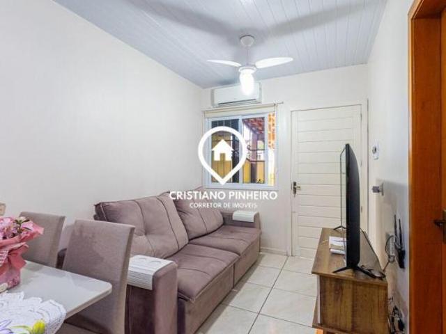 Casa com 3 dormitórios à venda no bairro Chácaras das Rosas Cachoeirinha/RS
