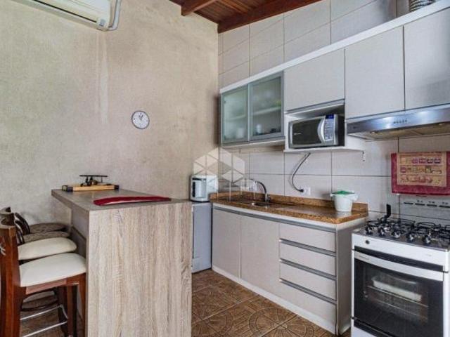 Casa com 3 dormitórios e 2 suítes no Bairro Cavalhada conforto e acessibilidade!