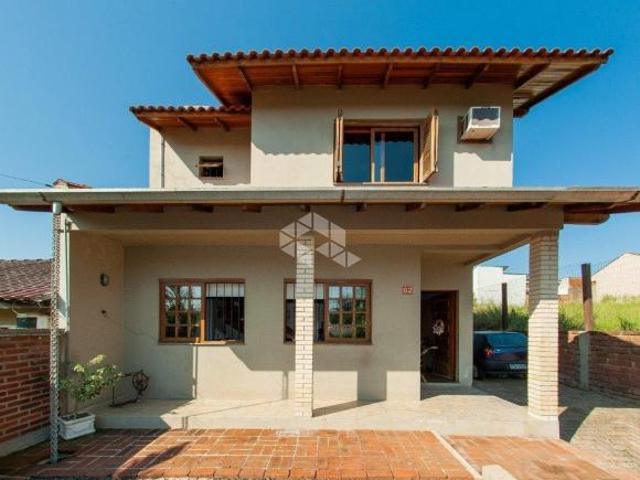 Casa com 3 dormitórios, piscina e muito bem localizado no bairro São João, em Montenegro