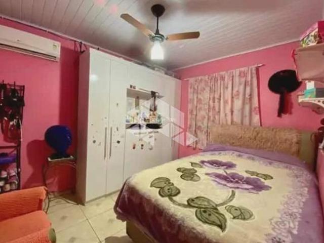 Casa com 3 dormitórios, 2 banheiros e 2 vagas