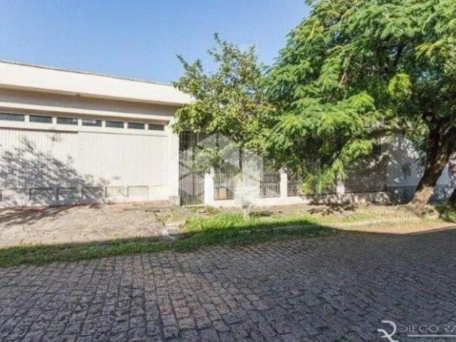 Casa com 3 quartos e 2 banheiros 214m² à venda em Chácara das Pedras, Porto Alegre por R$ 1.869.000