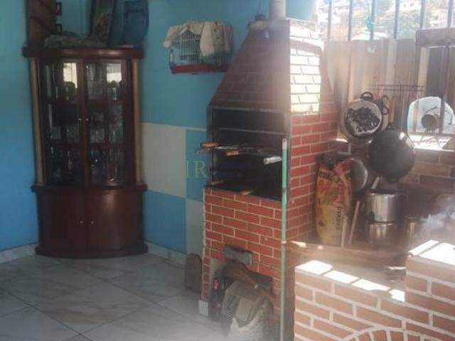 CASA COM TERRAÃ?O 03 QUARTOS