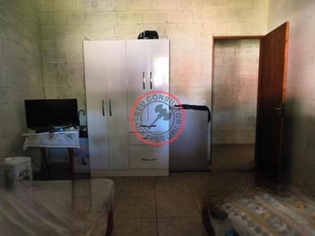 CASA COM TERRENO DE 400M2, CONSTRUÇÃO DE 128,71 AO FUNDO, 16 M DE FRENTE E 25 DE PROFUNDOS 2 QUARTOS