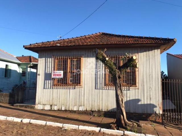 CASA COM TERRENO GRANDE