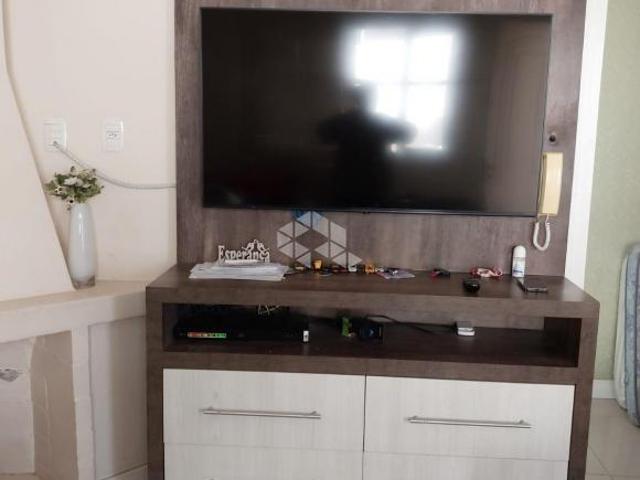 Casa com três dormitórios pátio amplo
