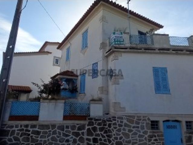 Casa com vistas para o rio