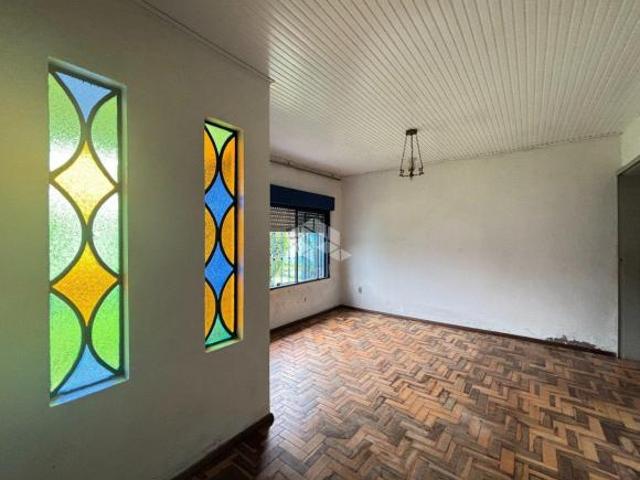 CASA COM AMPLO PÁTIO NO ARROIO GRANDE