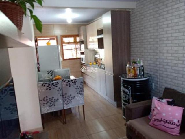 Casa com dois dormitórios, terreno todo cercado no Bairro Boa Saúde/NH