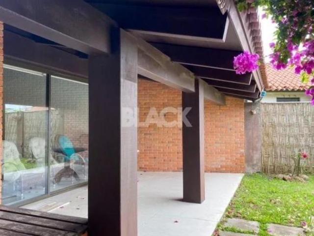 Casa com piscina na Praia Grande Torres RS