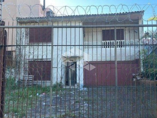 Casa com Predio a venda para investimento na Correa Lima