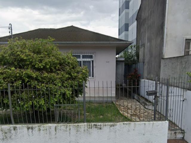 Casa com Quintal e Ar Condicionado na Praia Comprida