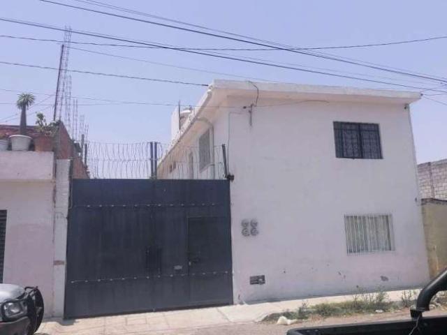 CASA CON 4 DEPARTAMENTOS EN VENTA
