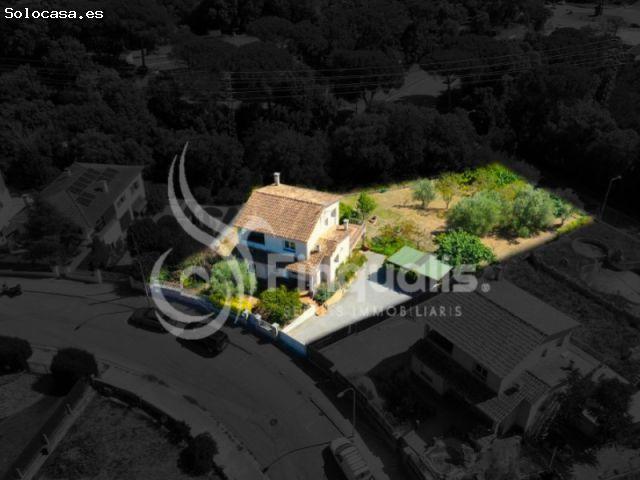 CASA CON TERRENO AMPLIO