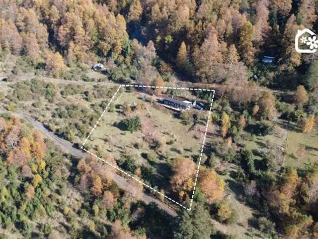 Casa con vista a volcán y valle en pucón la barda | 3 dormitorios por 170000. 00 en Pucón
