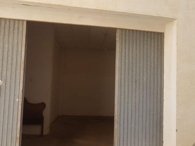 Casa con garaje y terraza en Quinto