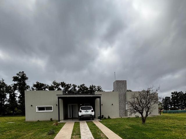 Casa con jardin