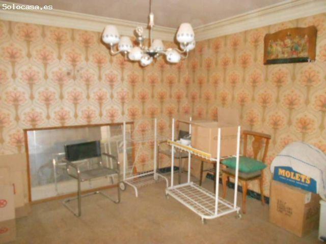 CASA CON LOCAL EN VENTA