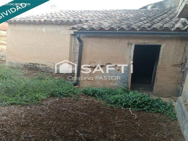 Casa con negocio y patio en Valdunquillo