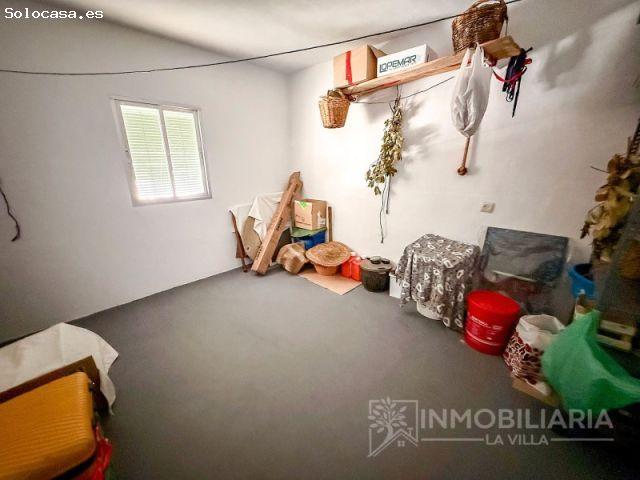 Casa con patio, terreno y segunda vivienda en venta en Yunquera