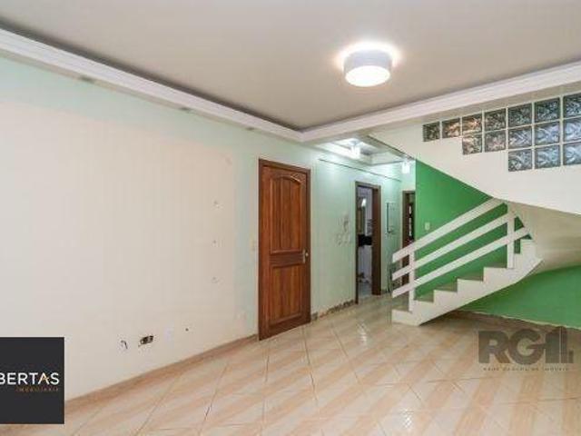 Casa Condominio no bairro Guarujá de 3 dormitórios 1 vaga