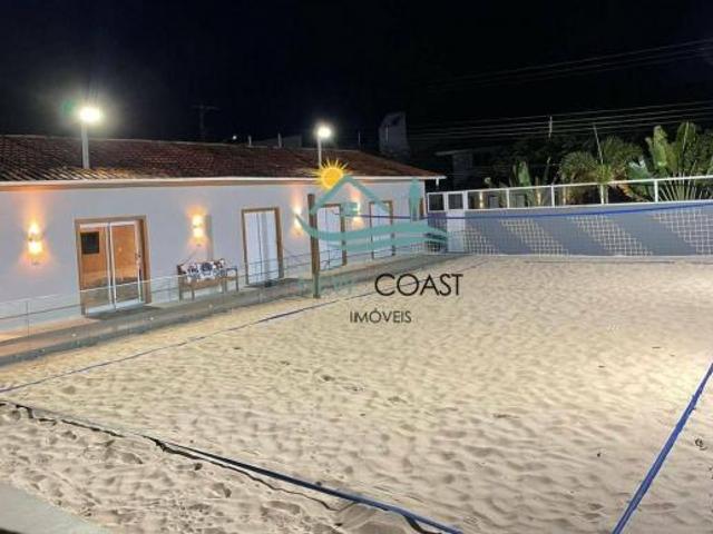 Casa de Alto Padrão com Quadra Privativa de Beach Tennis e Acesso ao Gramado de Guaecá