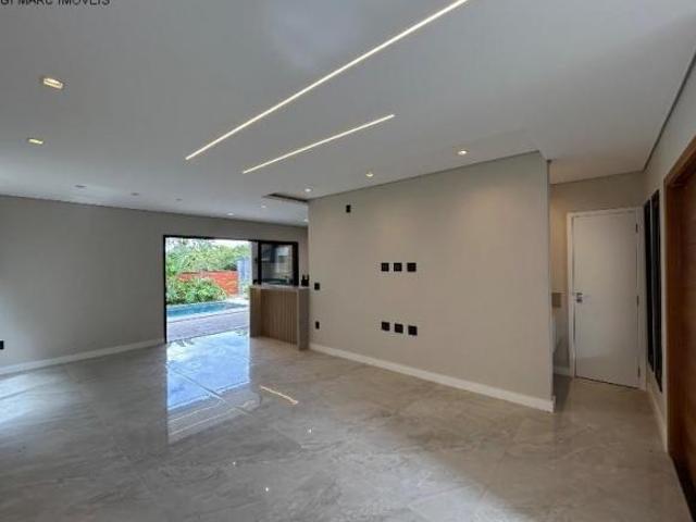 Casa de alto padrão em condomínio 3 quartos, 3 suítes, ambientes integrados, área gourmet, piscina