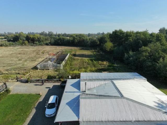 Casa de campo + terreno agrícola | ñiquén | 4 dormitorios por 9800.00 en Chile