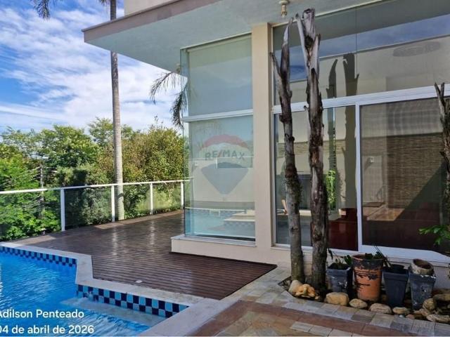 Casa de condomínio, 4 quartos, 402 m² de área útil, piscina e segurança, para locação
