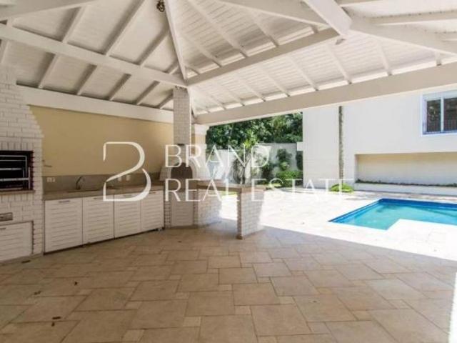 Casa de condomínio com 1100 m², 4 quartos sendo 4 suítes à venda no bairro Chácara Flora