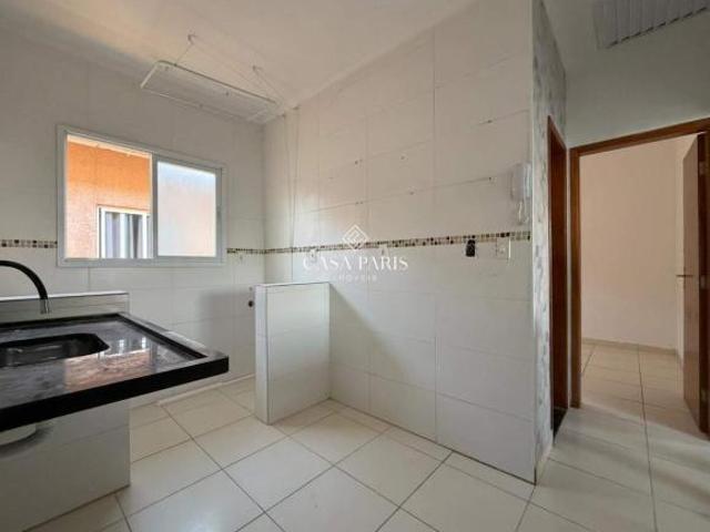 Casa de condomínio com 2 dormitórios à venda, 46 m² por R$ 280.000 Tude Bastos Praia Grande/SP
